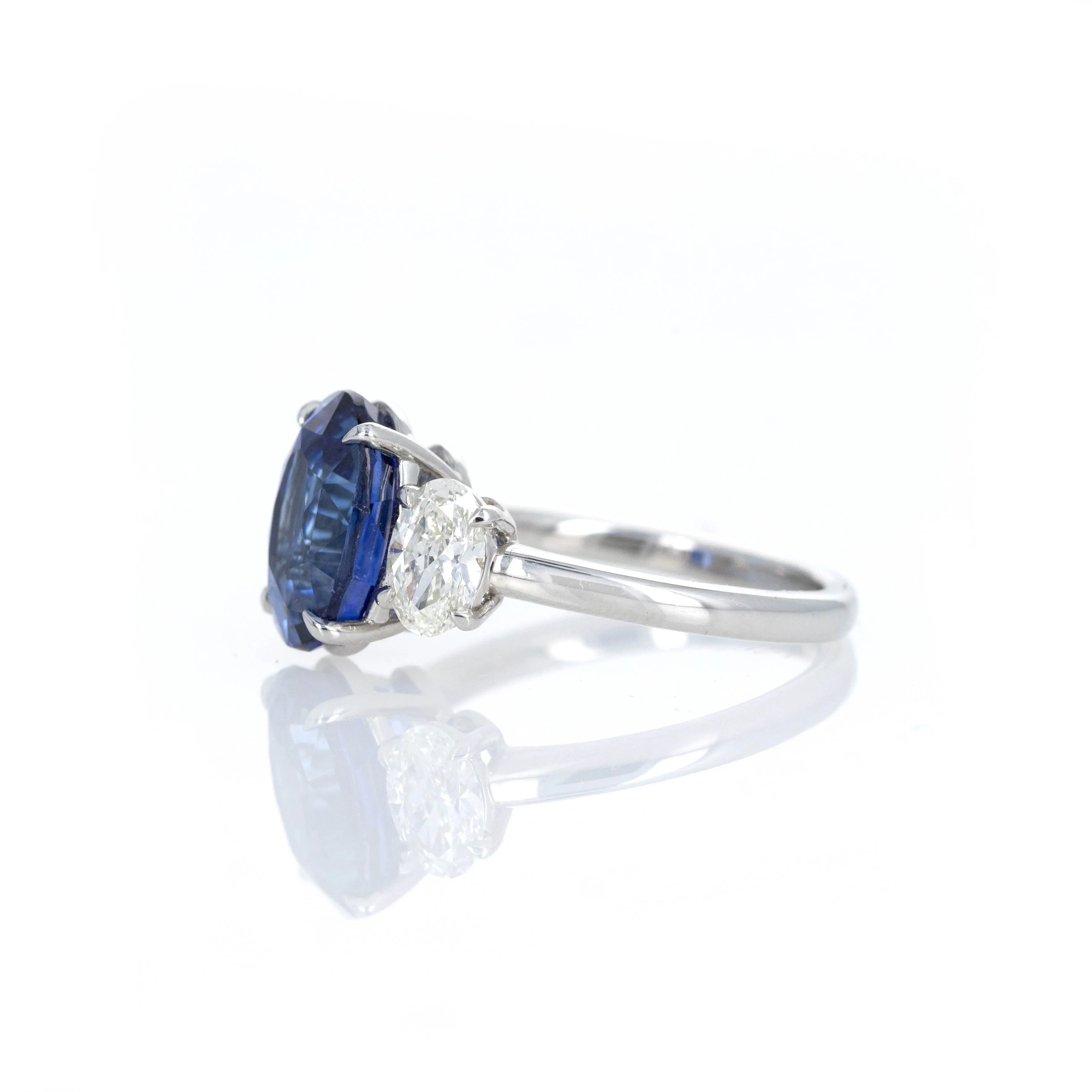 Platinum 5.12 Carat Oval Natural Sapphire Oval Diamond Three Stone Ring